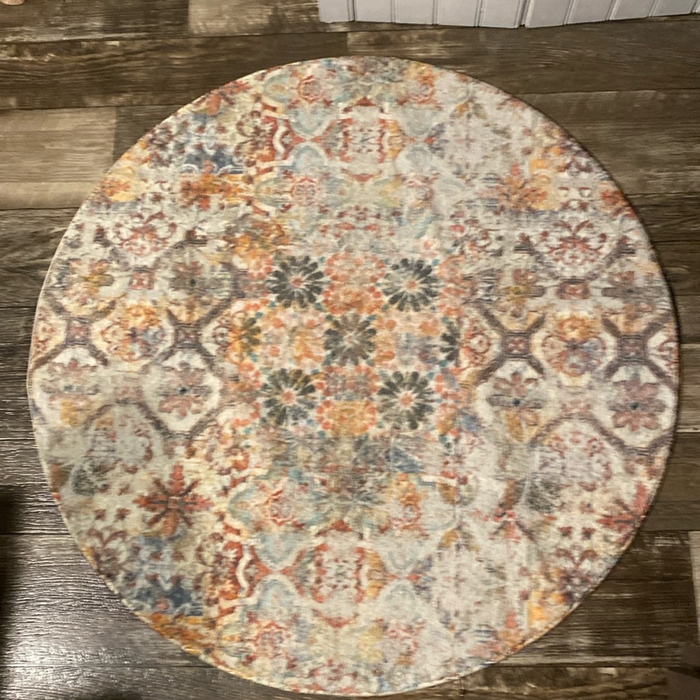 36” round muted rug